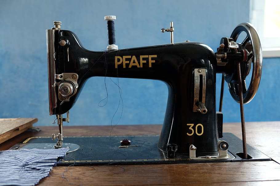 sewing machine, craft, tailoring, bobbin, thread, coil, metal, day, table, focus on foreground