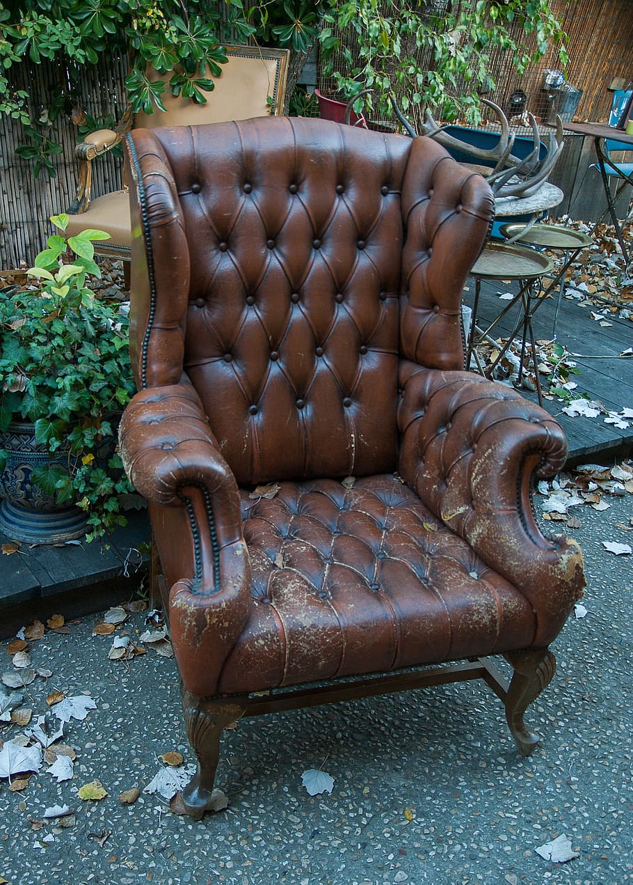 brown, leather armchair, black, asphalt road, flea market, armchair, seat, furniture, former furniture, day