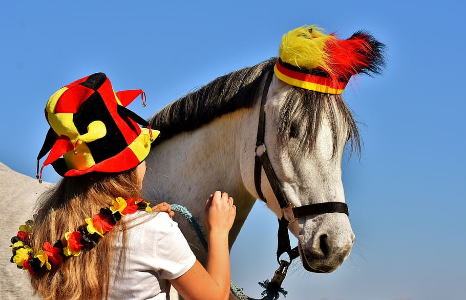 woman, wearing, joker hat, white, horse, daytime, mold, girl, germany, world cup 2018