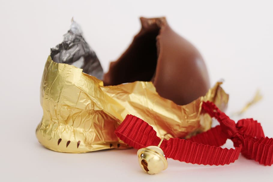 chocolate, red, gold string bell, easter bunny, packaging, eaten up, delicious, still life, indoors, white background