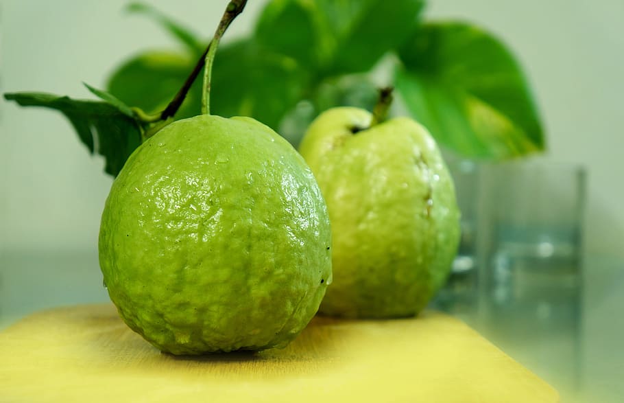 two green fruits, fruits, guava, food, food and drink, healthy eating, fruit, freshness, green color, wellbeing
