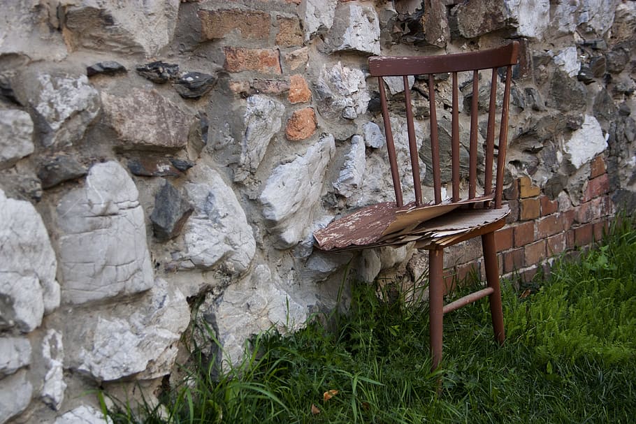 rock, chair, stone, architecture, built structure, wall - building feature, day, wall, weathered, outdoors