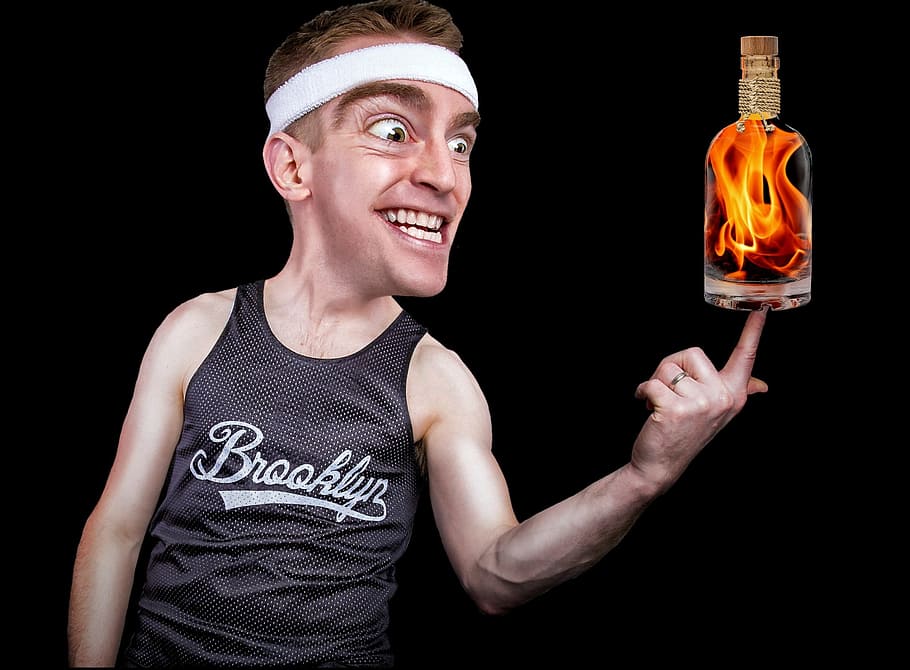 man, holding, flaming, bottle sticker, crazy, fire water, bottle, balance, funny, black background