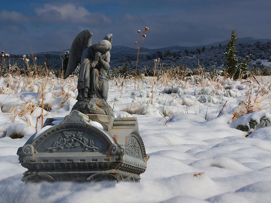 angel statue, surrounded, snow, cemetery, graveyard, tombstones, gravestone, angel, stone sculpture, wing