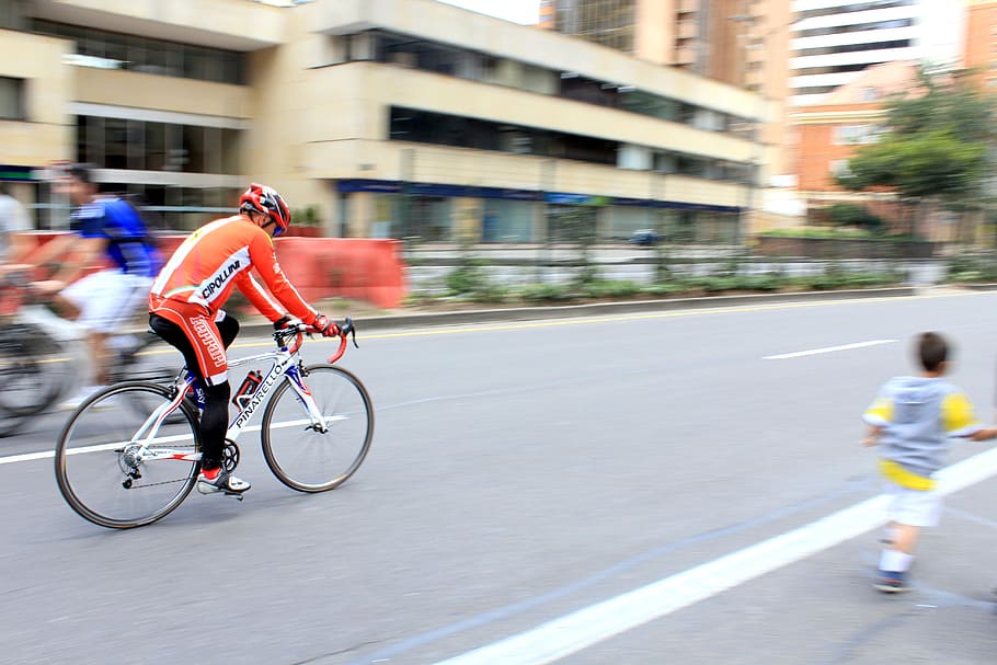 cycling, sport, bogotá, transportation, real people, blurred motion, motion, bicycle, city, street