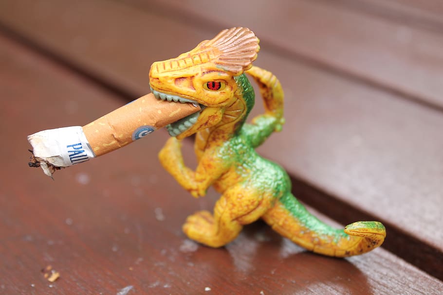 Dragon Cigarette Butt Toy Plastic Angry Smoking Teeth