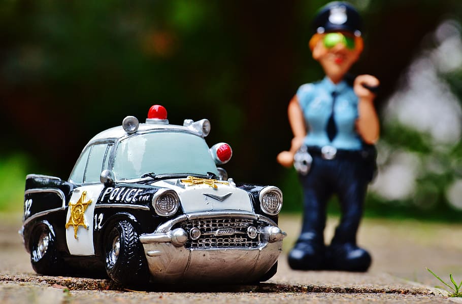 policewoman, police, police car, figure, funny, fun, handcuffs, uniform, cap, mode of transportation