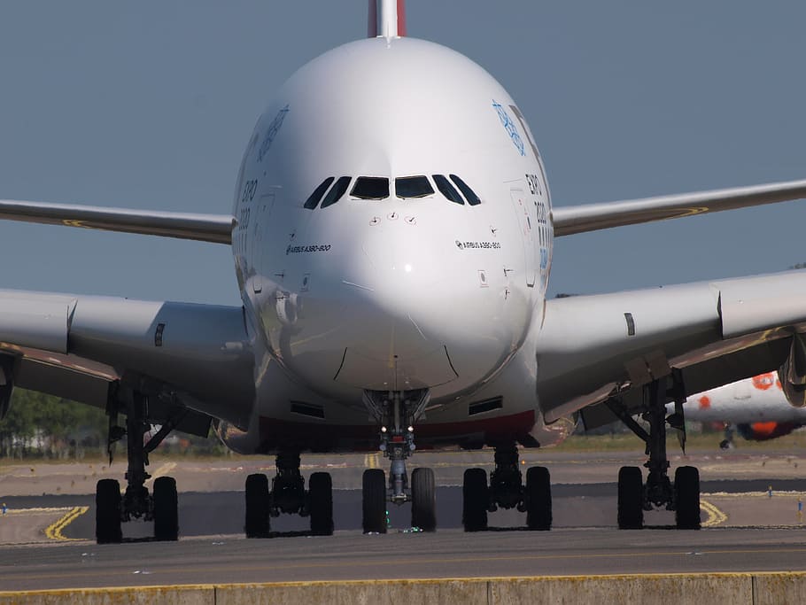 close-up photography, airplane, runway, daytime, emirates, airbus a380, aircraft, plane, airport, jet