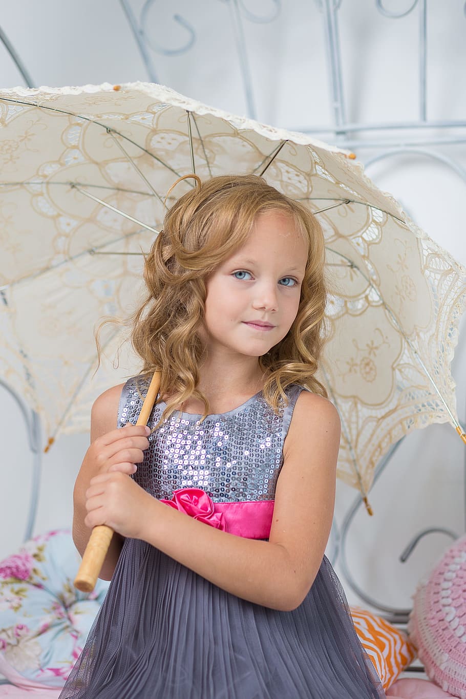 girl, wearing, gray, sequin sleeveless dress, holding, beige, umbrella, young, pretty, model