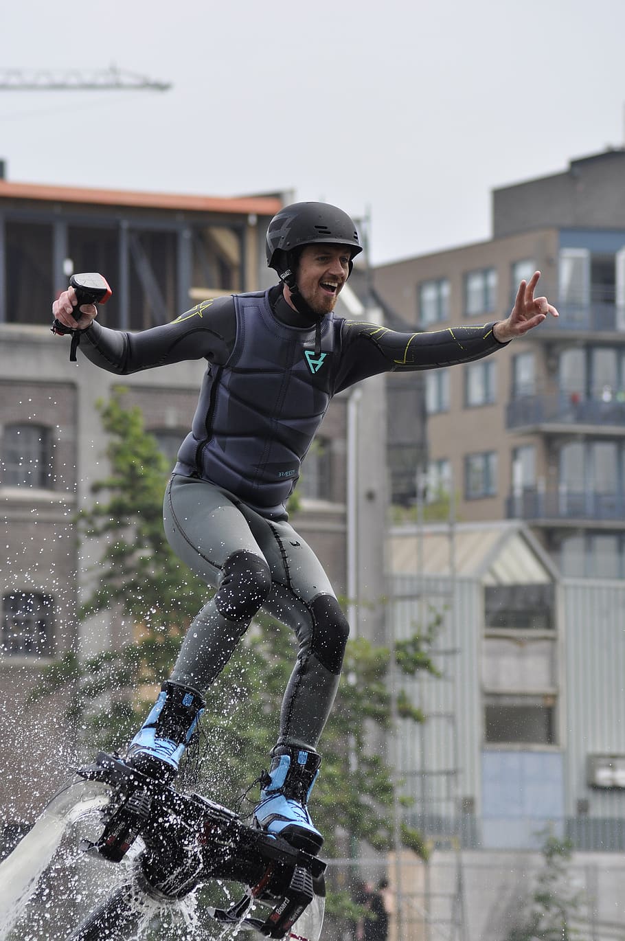 flyboarding, jetboarding, water, extreme sports, activity, action, extreme, one person, building exterior, young adult