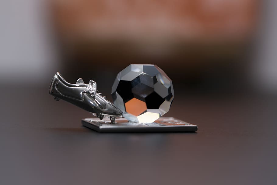 primer plano, fútbol, ​​fútbol, ​​pelota, tacos, bota, miniatura, trofeo, premio, vidrio