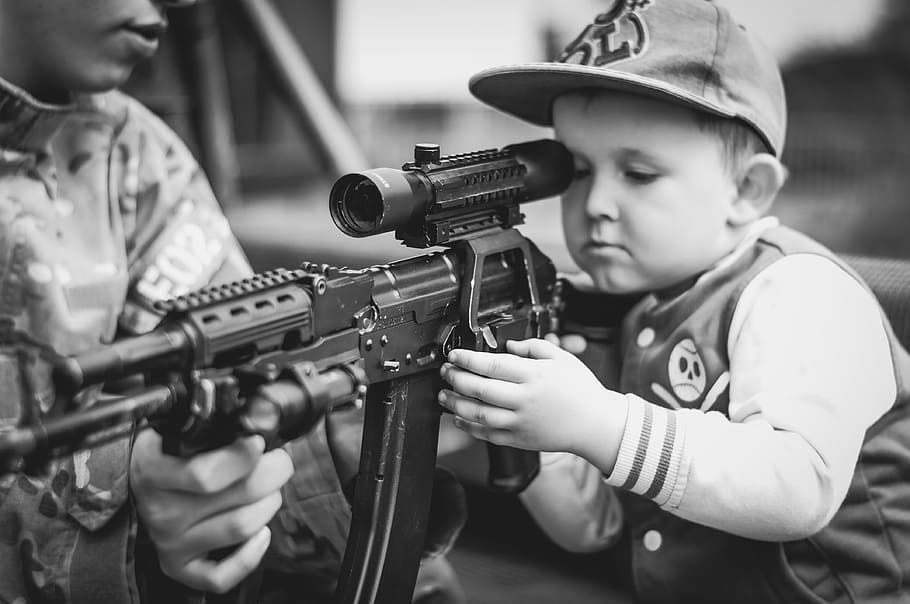 boy, wearing, flat, brim cap, holding, assault rifle, child, portrait, military, weapon
