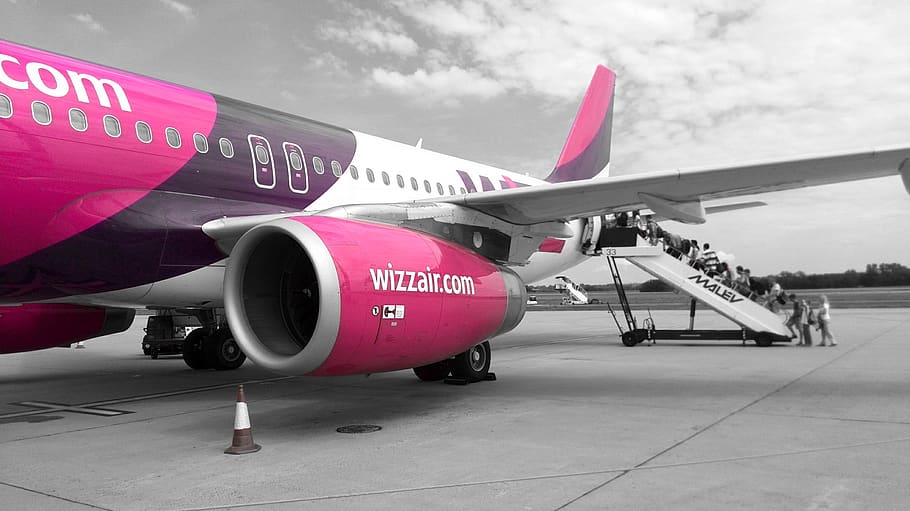 wizzair, flying, airport, simple, pink, cheap, mode of transportation, air vehicle, transportation, airplane