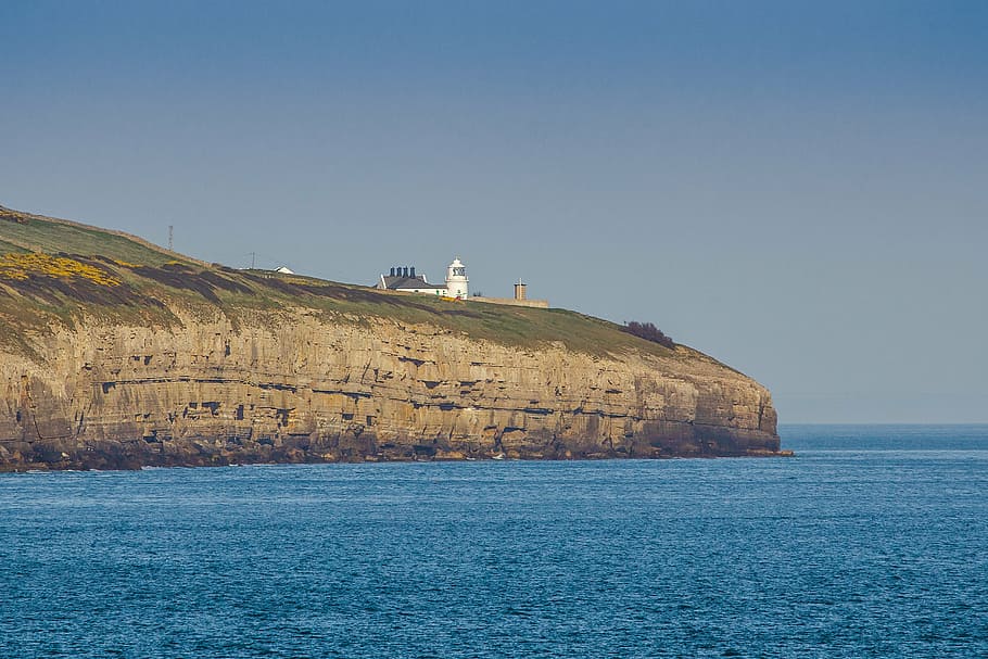 lighthouse, cliff, coast, ocean, jurassic coast, dorset, sea, water, blue, outdoors