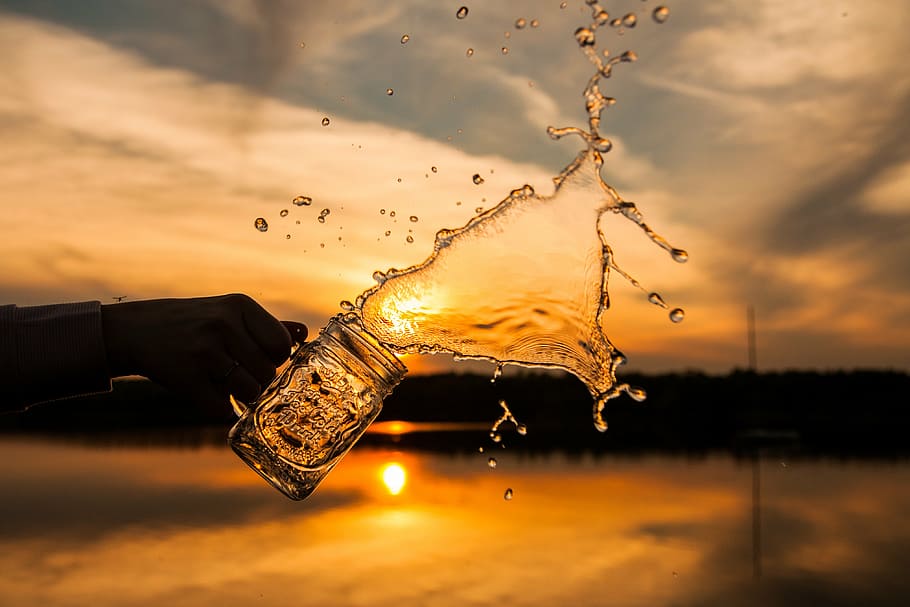 person, holding, beer glass, glass, jar, water, drink, sunset, silhouette, sky
