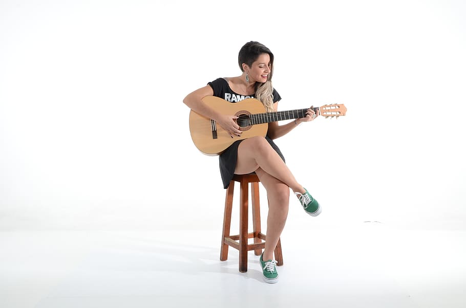 woman playing guitar, music, rock, girls, pop, beautiful, fashion, chair, performance, guitar