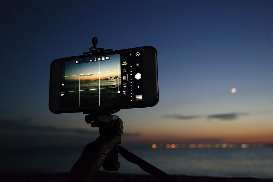 black smartphone, evening, iphone, macro, ocean, photography, sea, sky, smartphone, taking photo