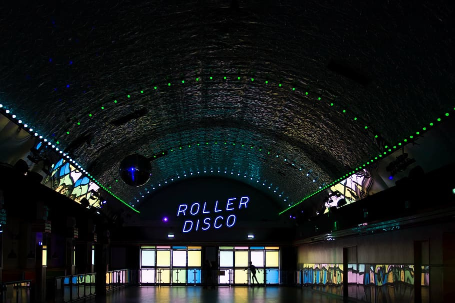 roller disco dance hall, roller, disco, stadium, dark, inside, gym, building, mirror, glass