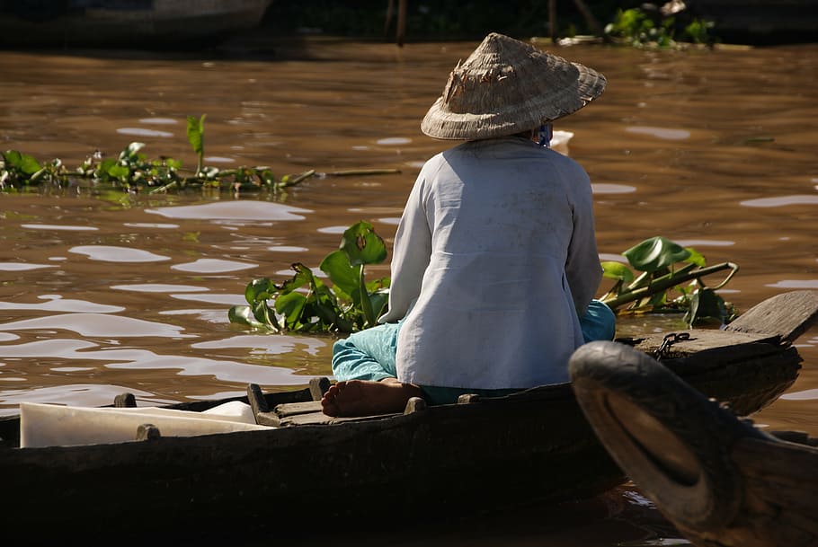 woman, sitting, wooden, boat, mekong, floating market, vietnam, travel, tourism, water