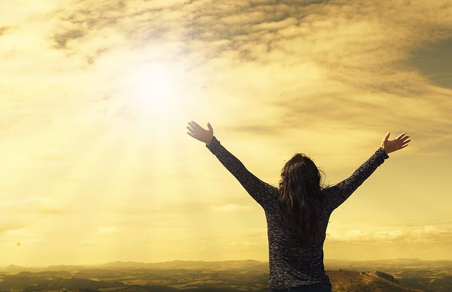 woman, wearing, gray, sweatshirt, raising, hands, sky, asking god, prayer, open arms