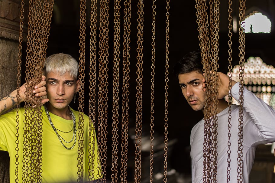 men, models, fashion, chains, punishment, prison, portrait, architecture, two people, looking at camera