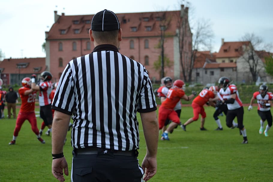 referee, black and white clothing, american football, sport, contact game, group of people, men, clothing, striped, rear view