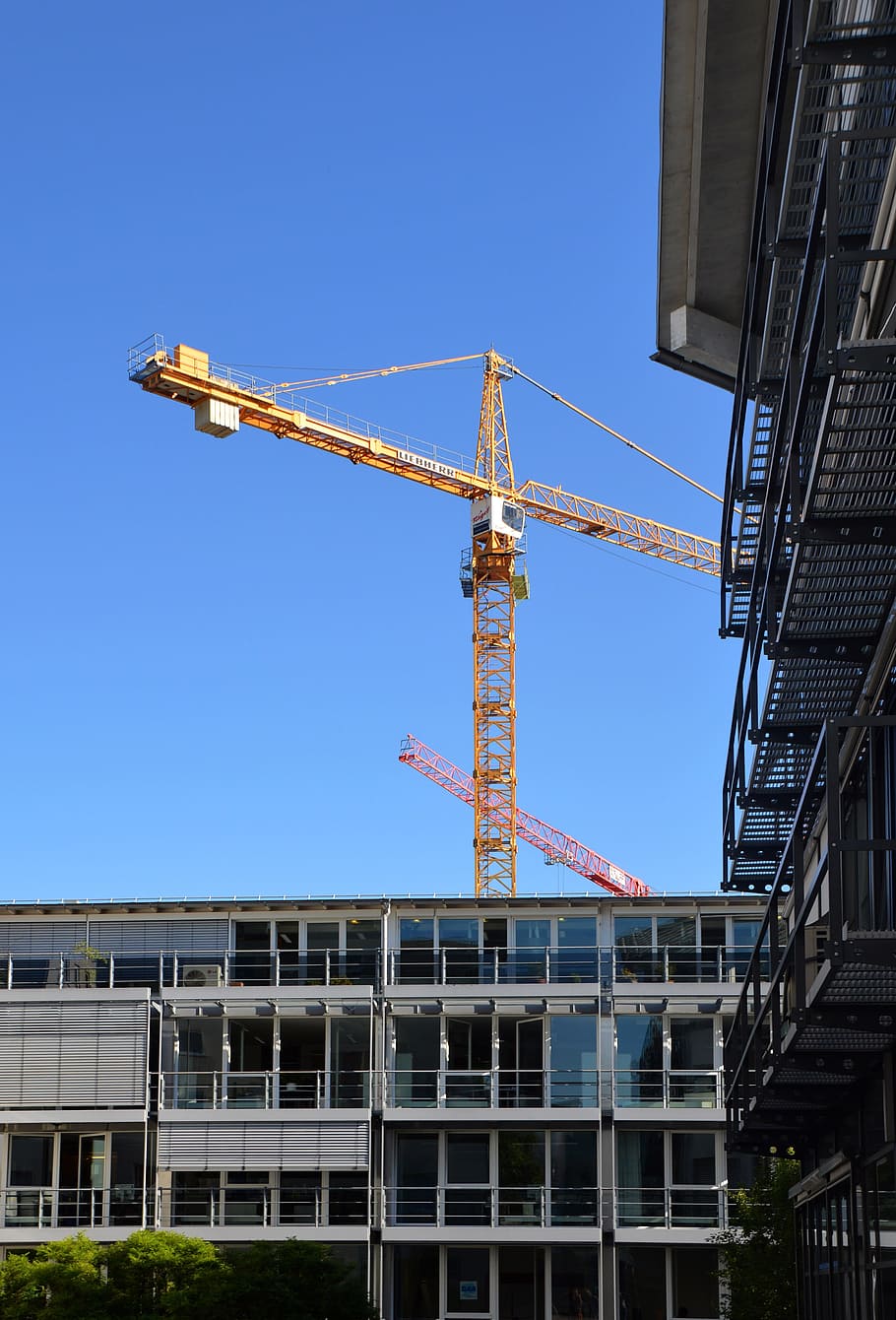site, crane, scaffolding, building construction, action, sky, noise pollution, urban planning, machinery, architecture