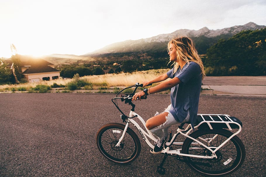 woman, riding, white, bicycle, road, blue, bike, daytime, girl, blonde
