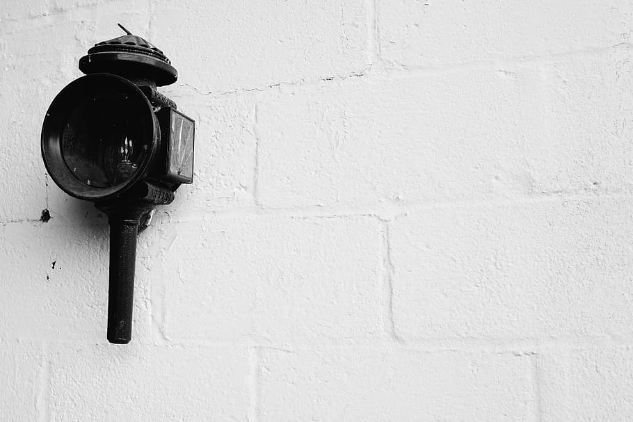 black lens, black, sconce, lantern, wall, concrete, black and white, indoors, close-up, white background