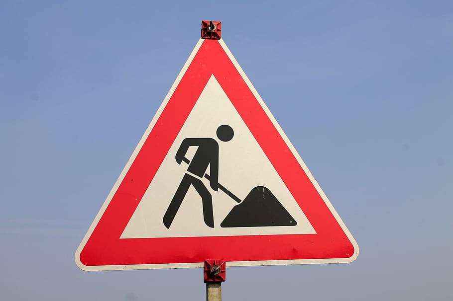 man, working, ahead, road signage, shield, marking, site, construction site sign, note, sign
