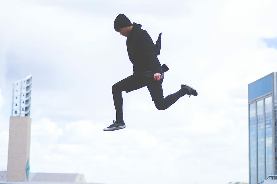 photography, man, wearing, black, beanie, top, pants, low, sneakers, jumping