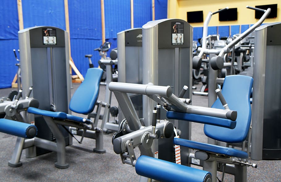 blue-and-gray exercise equipment lot, gym room, fitness, sport, equipment, treadmill, elliptical machine, stationary bike, cardio training, performance