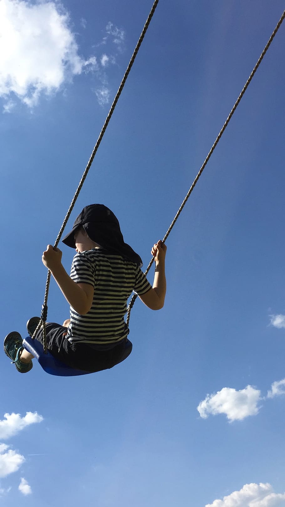 swing, child, sky, sky blue, clouds, fun, joy, one person, leisure activity, low angle view