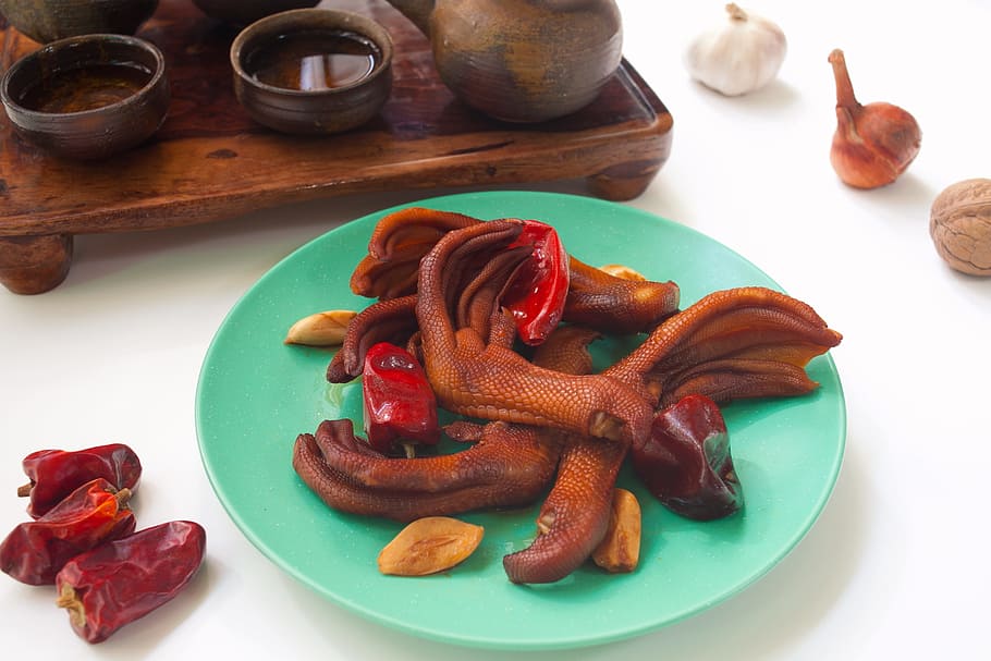 duck feet, snack, sauce, red pepper, garlic, food and drink, food, plate, freshness, indoors
