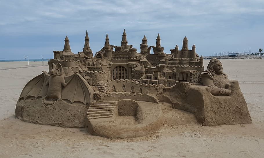 beige sandcastle, beach, sand, sand castle, sea, sky, history, the past, built structure, architecture