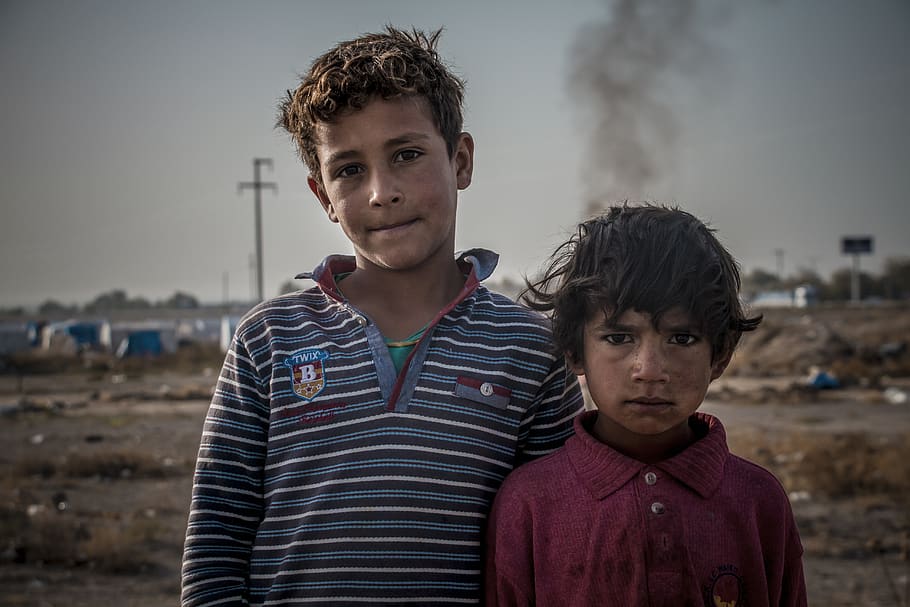 child, migration, childhood, sadness, hungry, poverty, war, iraq, portrait, looking at camera
