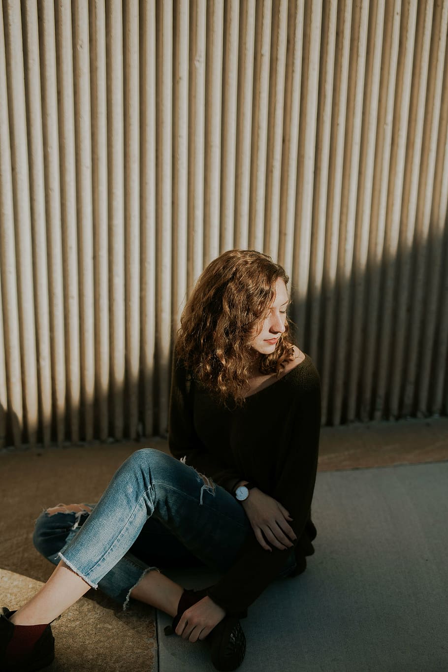 woman, sitting, floor, wall, people, fashion, beauty, brunette, casual, ripped jeans