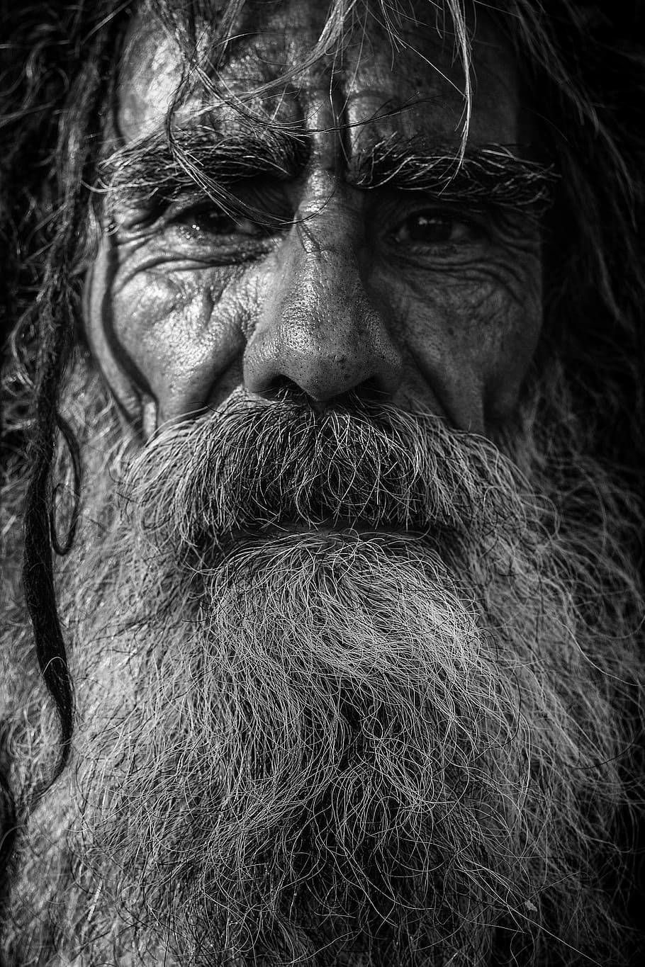 grayscale photo, man wit beard, beard, close-up, dark, elderly, facial hair, hair, man, old