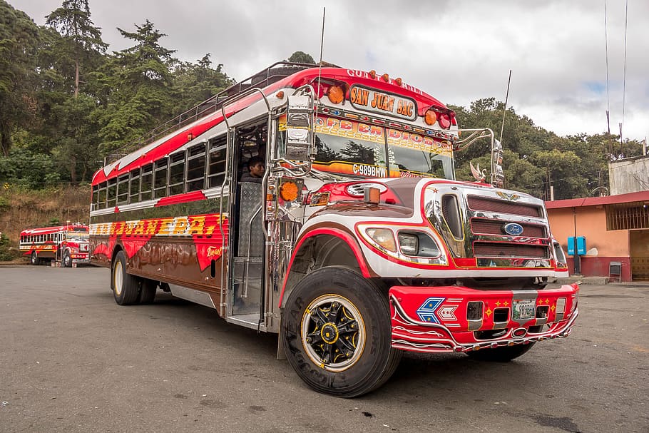 transport, automobile, bus, the extra, guatemala, transportation, mode of transportation, land vehicle, cloud - sky, red