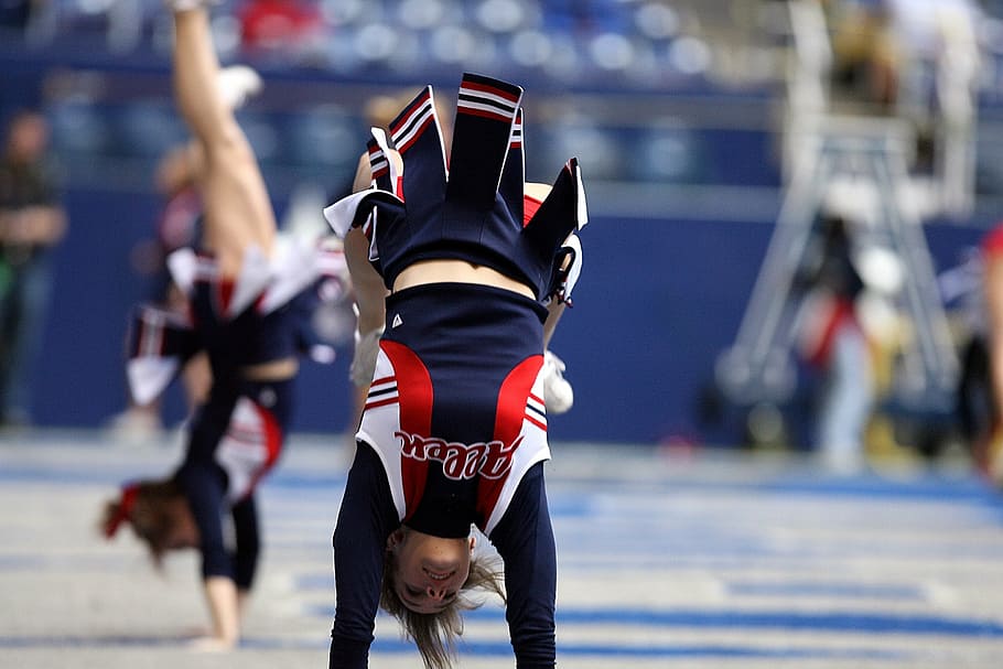 woman, posing, cheering, daytime, cheerleader, somersault, acrobatic, american football, game, motivation