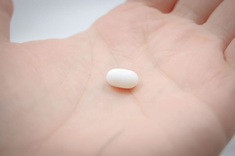 person, holding, white, pill, tablet, the hand, hand, tictac, the pill, sweet