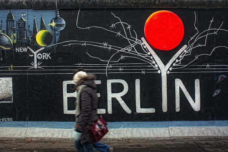 person, walking, road, mural, painted, wall, east side gallery, berlin, structures, building