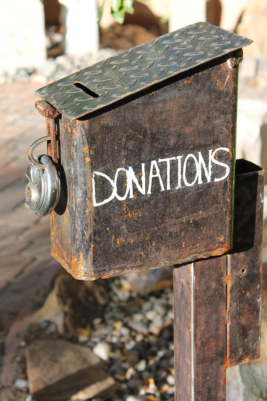 brown, metal donations box, donations, donation box, charity, donate, donating, altruism, helping, altruistic