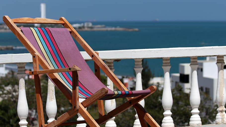 Chair, Beach, Marina, Balusters, water, wood - material, sea, day, outdoors, focus on foreground