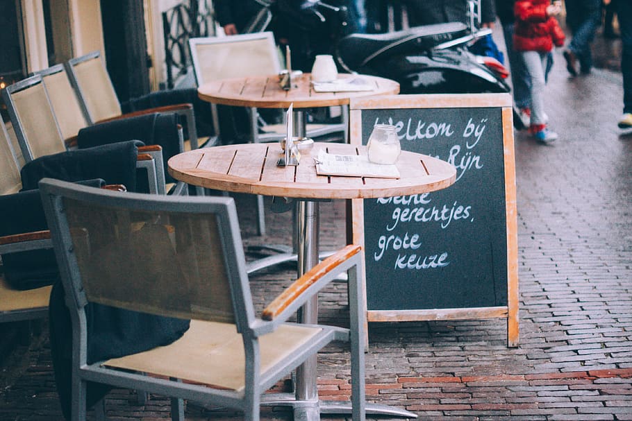 cafe, restaurant, tables, chairs, sidewalk, cobblestone, city, urban, food, text
