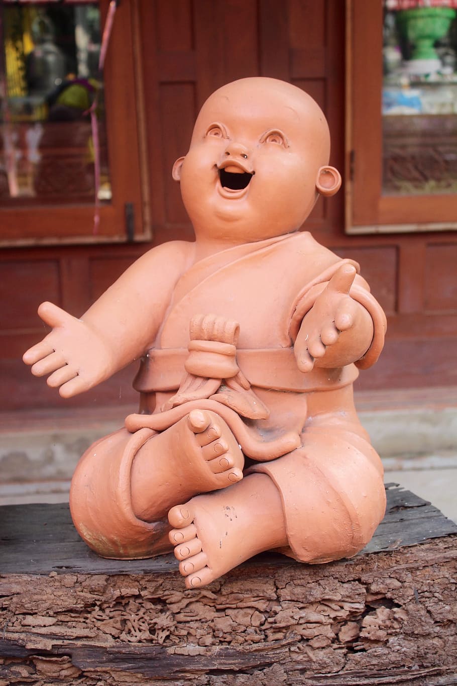 baby doll laughing, buddha, figures, stone figure, sculpture, statue, buddhism, yoga, funny, glasses