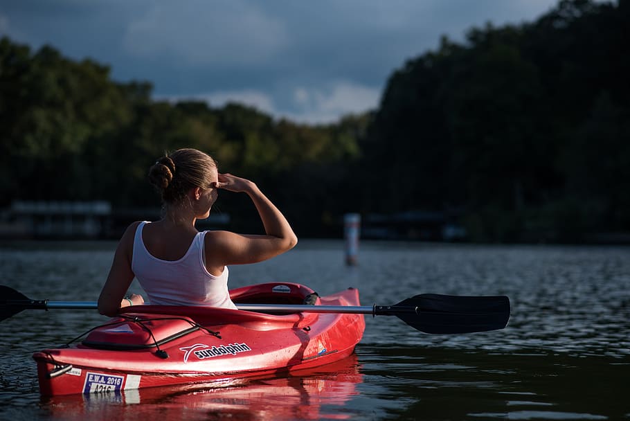 woman, riding, kayak, holding, paddle, middle, calm, body, water, surrounded