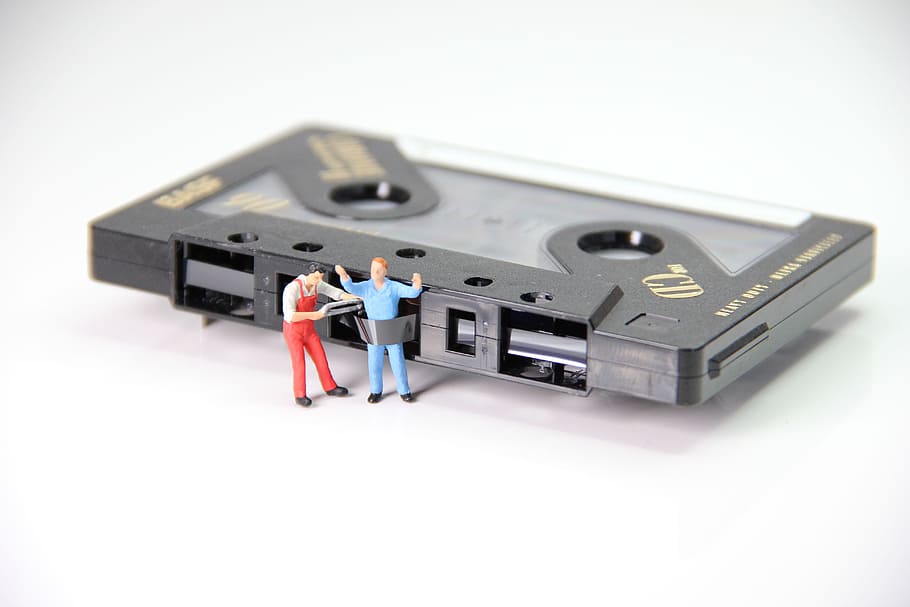 black, cassette tape, man figurine, cassette, caught, miniature figures, data, computer, technology, equipment