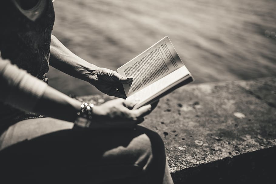 book, reading, people, black and white, one person, holding, real people, human hand, day, hand