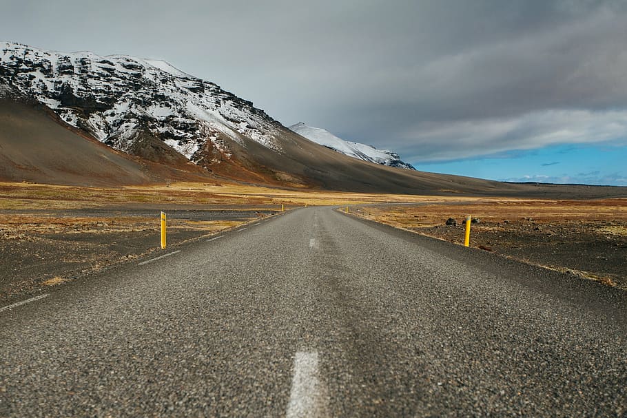asphalt road, mountain, gray, concrete, road, clouds, highway, pavement, grass, field